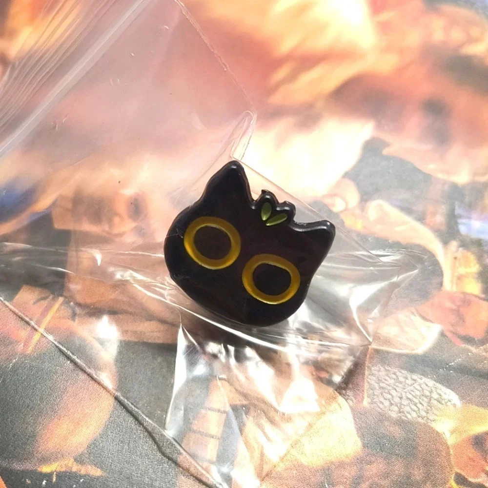 Black cat head with yellow eyes enamel pin clothes backpack hat bag cap denim